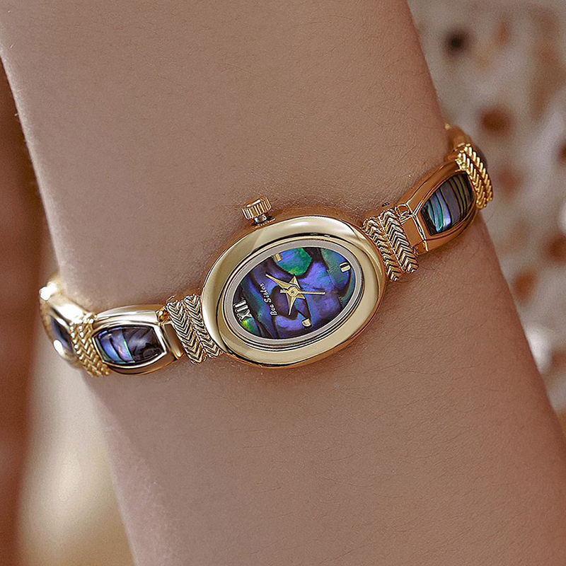 البيضاوي الهاتفي النساء ساعات  - مراجعة Luxury Watch Brand For Women وسعره