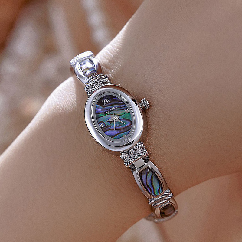 البيضاوي الهاتفي النساء ساعات  - مراجعة Luxury Watch Brand For Women وسعره